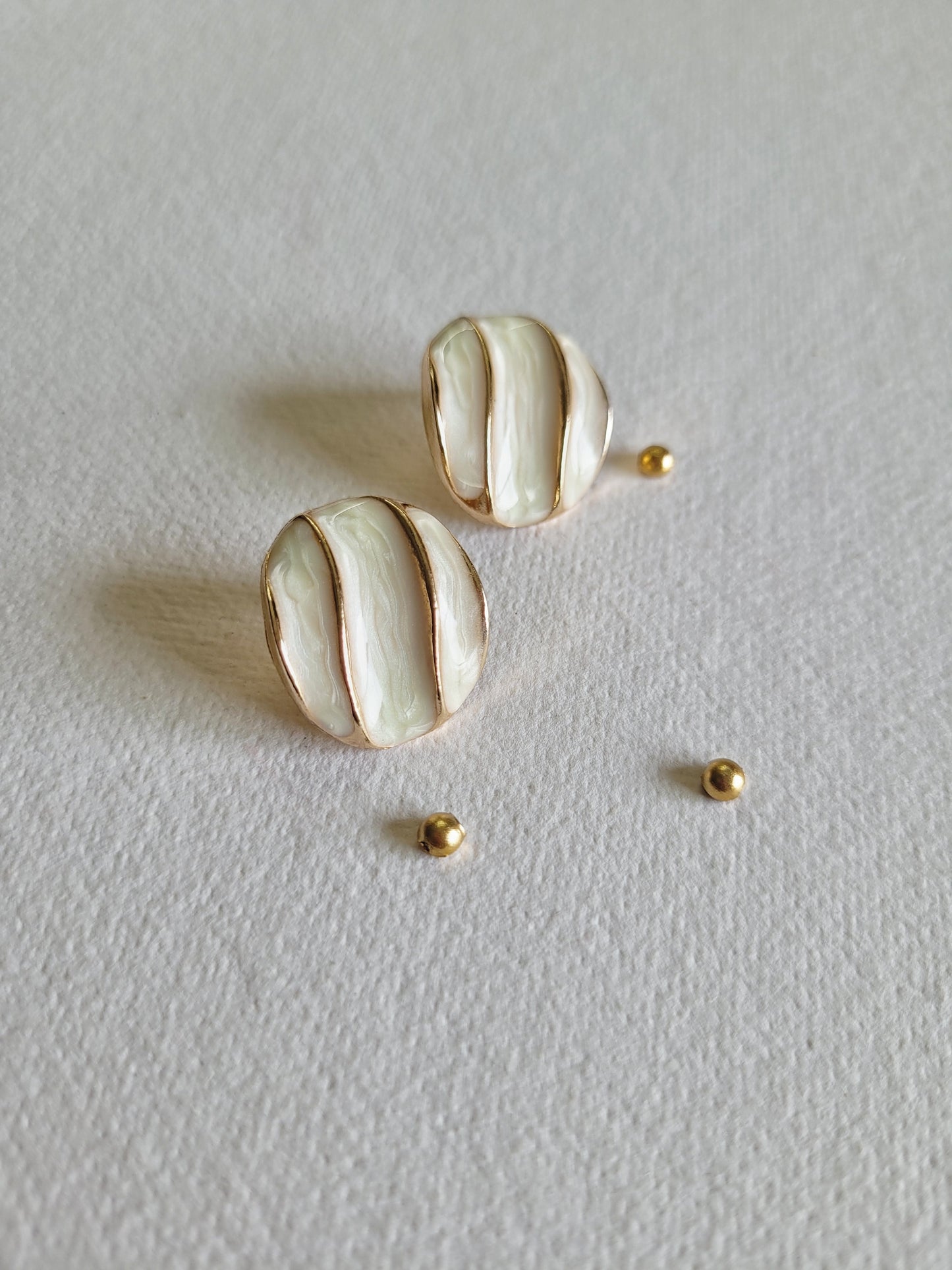 White Enamel Swirl Stud Earrings