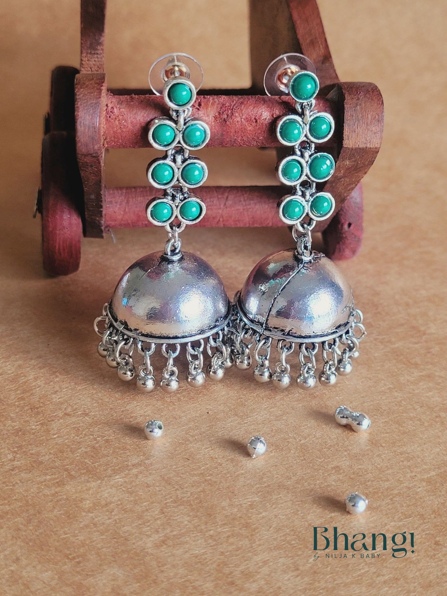 Silver Green Jhumka Earrings