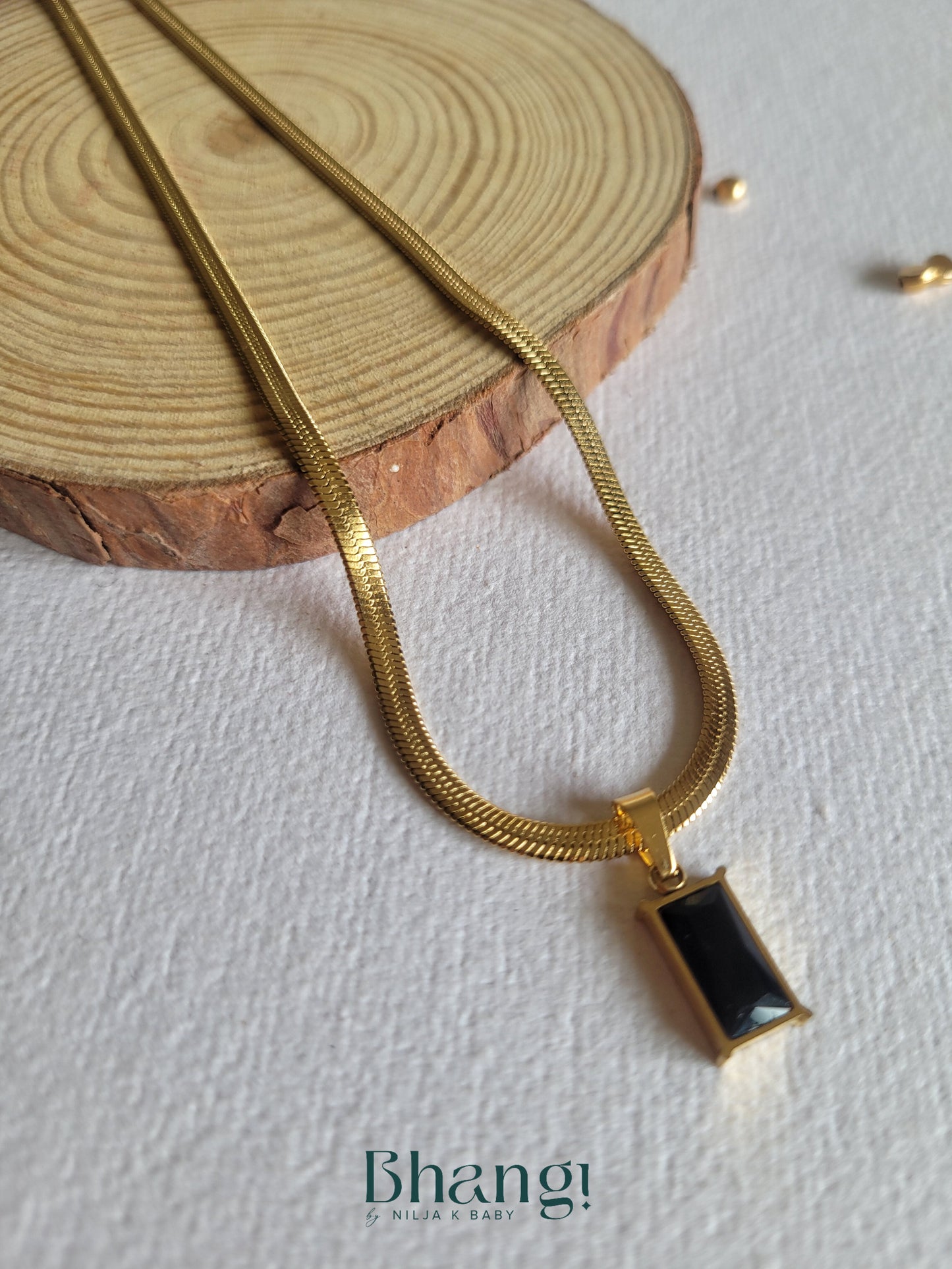 Sleek Herringbone Chain with Black Stone Pendant