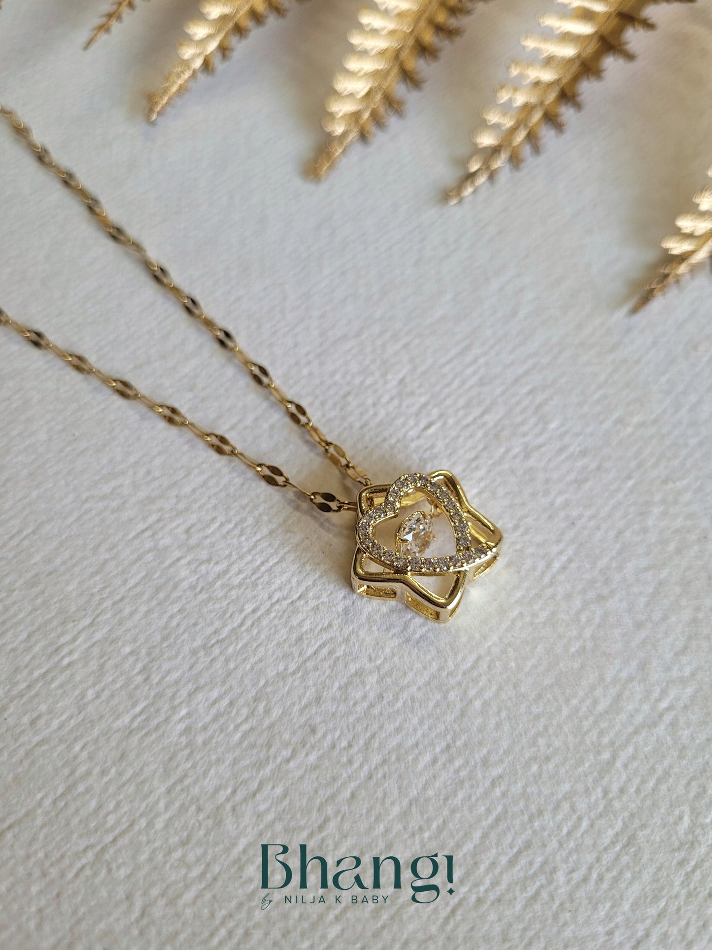 Gold-Tone Starburst Heart Pendant Necklace