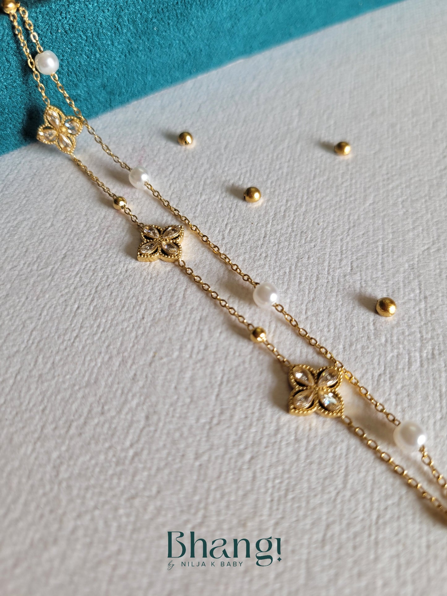 Gold-Tone Pearl and Floral Charm Bracelet