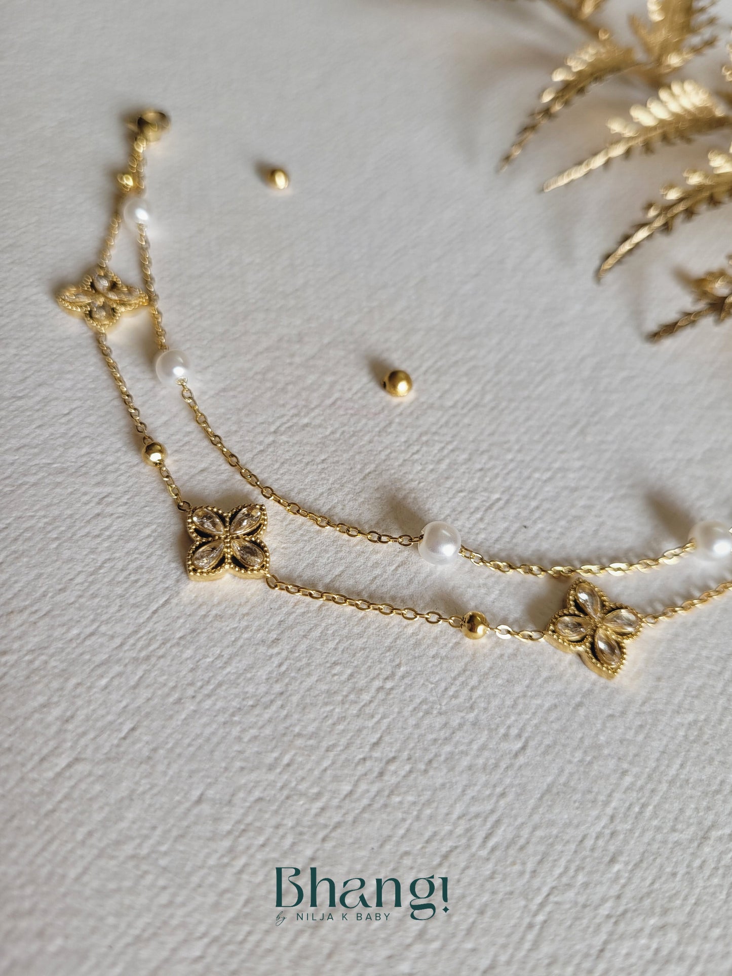 Gold-Tone Pearl and Floral Charm Bracelet