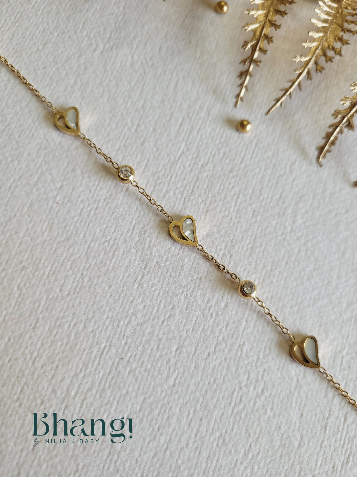Gold-Tone Heart and Crystal Charm Bracelet