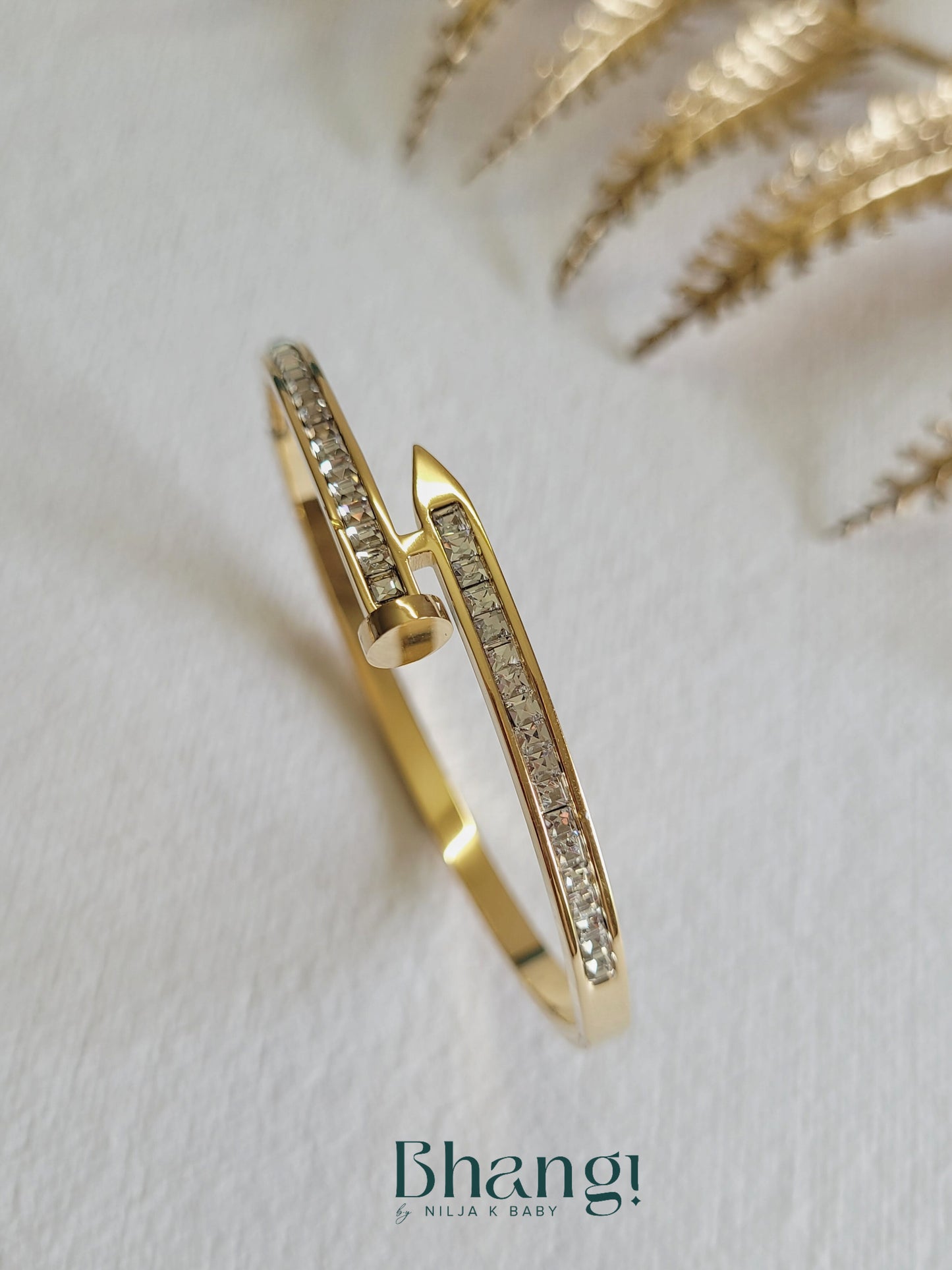 Gold-Tone Nail Bangle with Crystal Detail