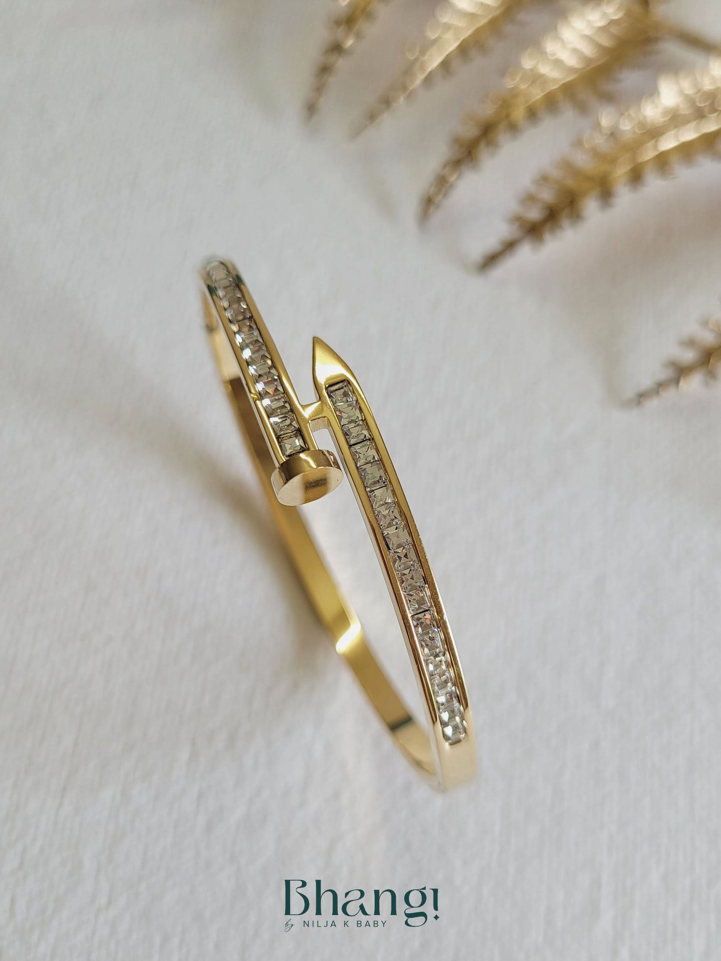 Gold-Tone Nail Bangle with Crystal Detail