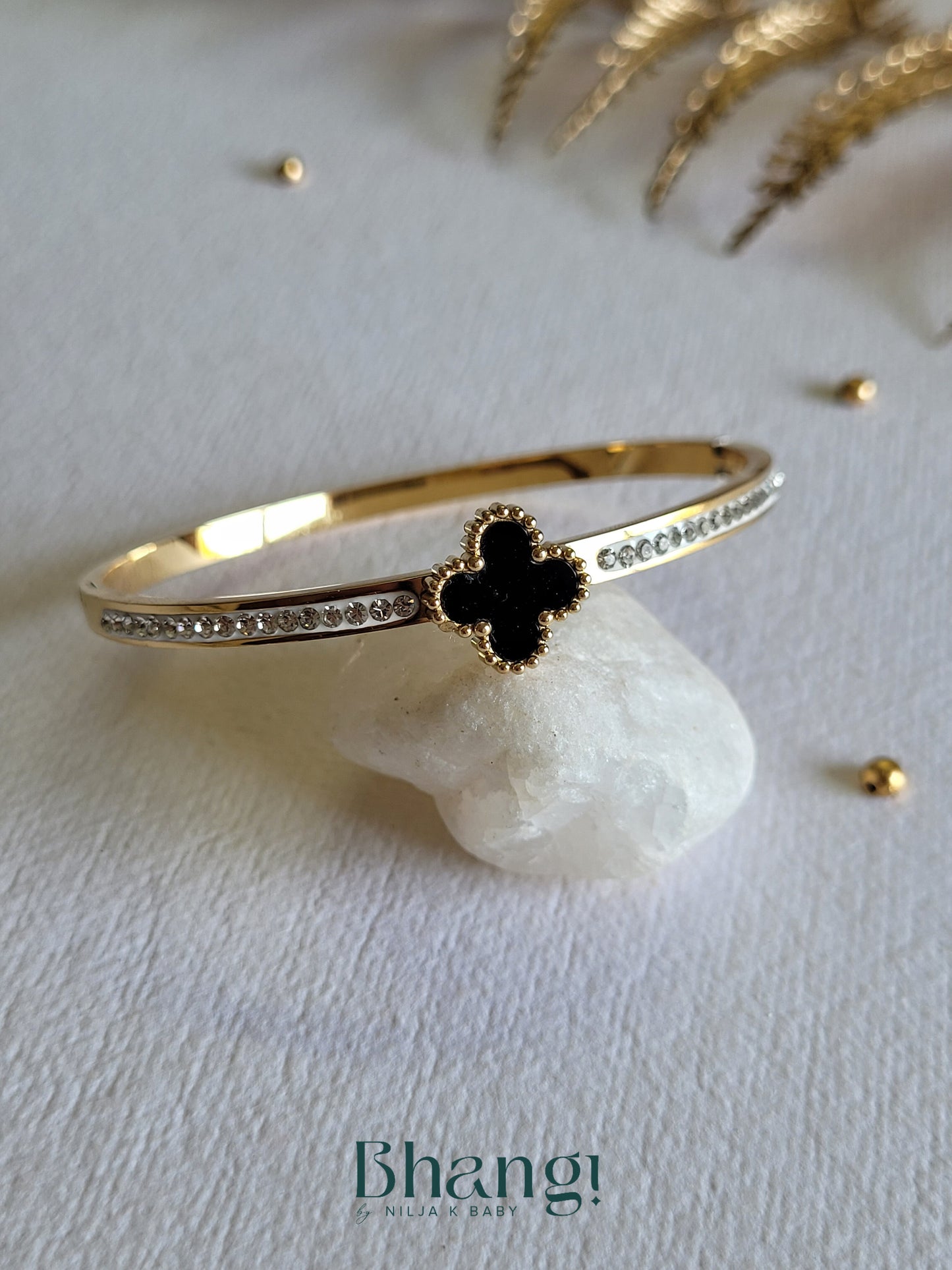 Gold-Tone Clover Bangle with Crystal Accents