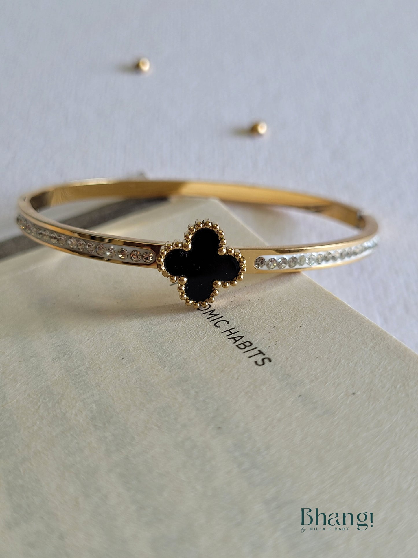 Gold-Tone Clover Bangle with Crystal Accents