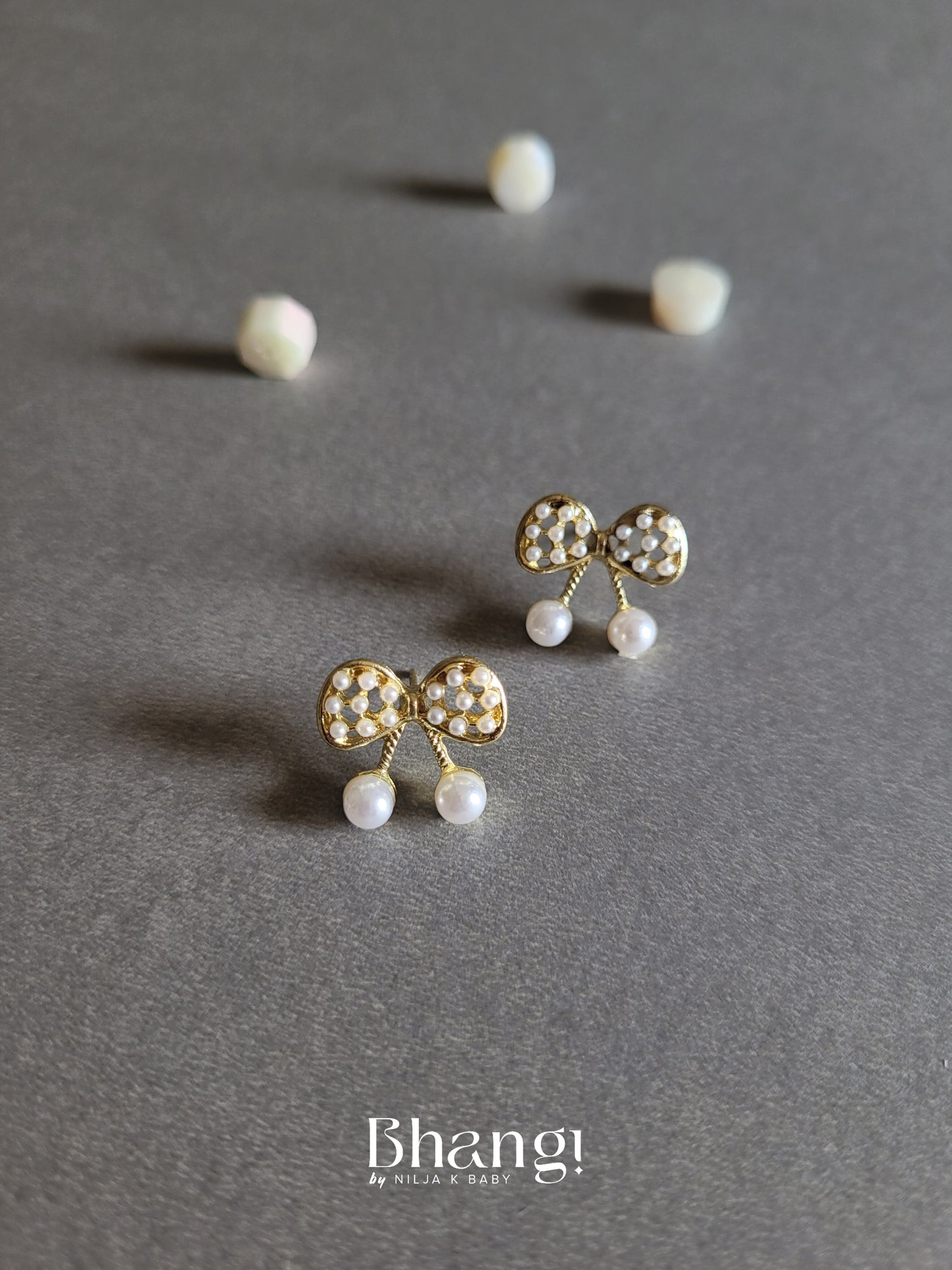 Pearl Bow Stud Earrings