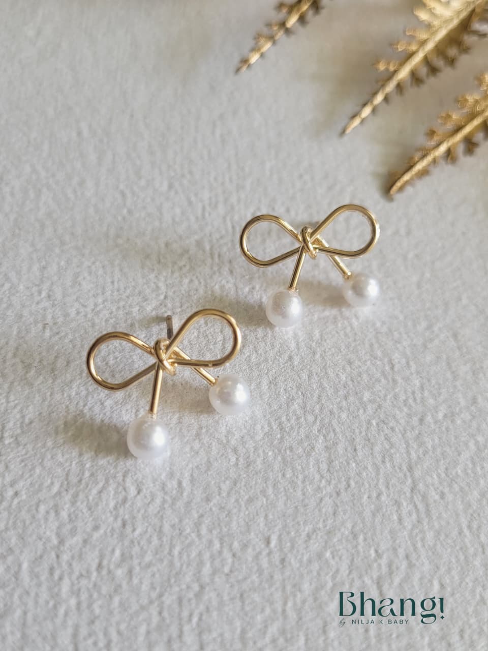 Golden Bow Pearl Studs