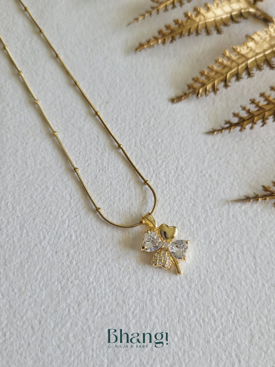 Golden Flutter Charm Necklace