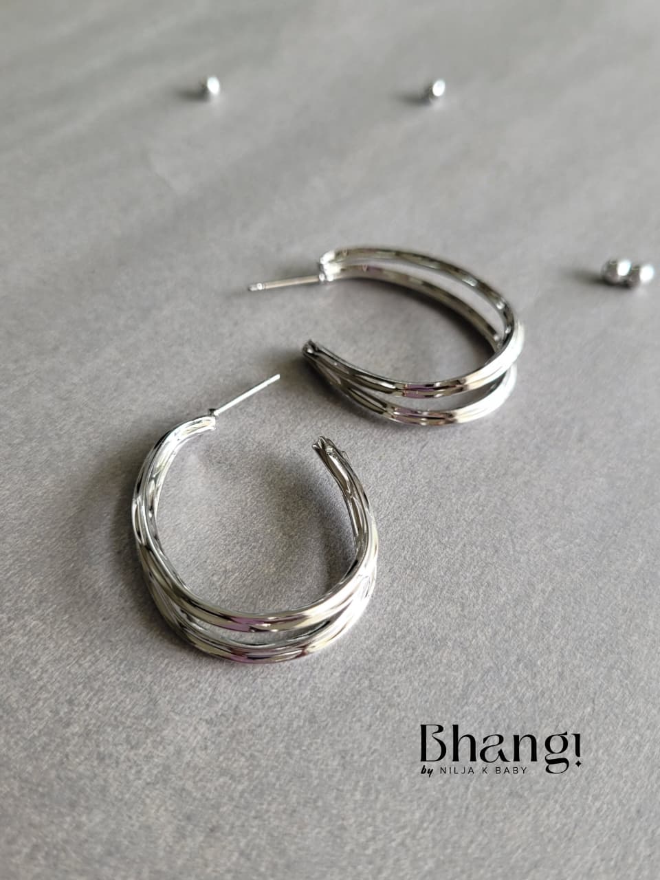 Infinity Wave Hoop Earrings – Silver