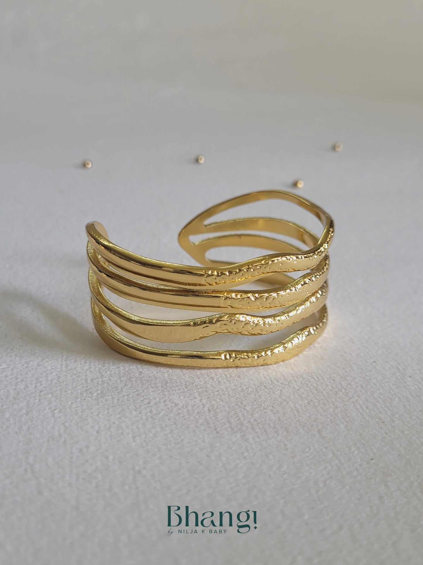 Textured Wave Cuff Bangle – Gold Finish