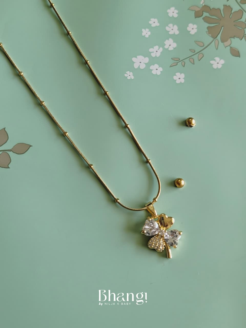 Golden Flutter Charm Necklace