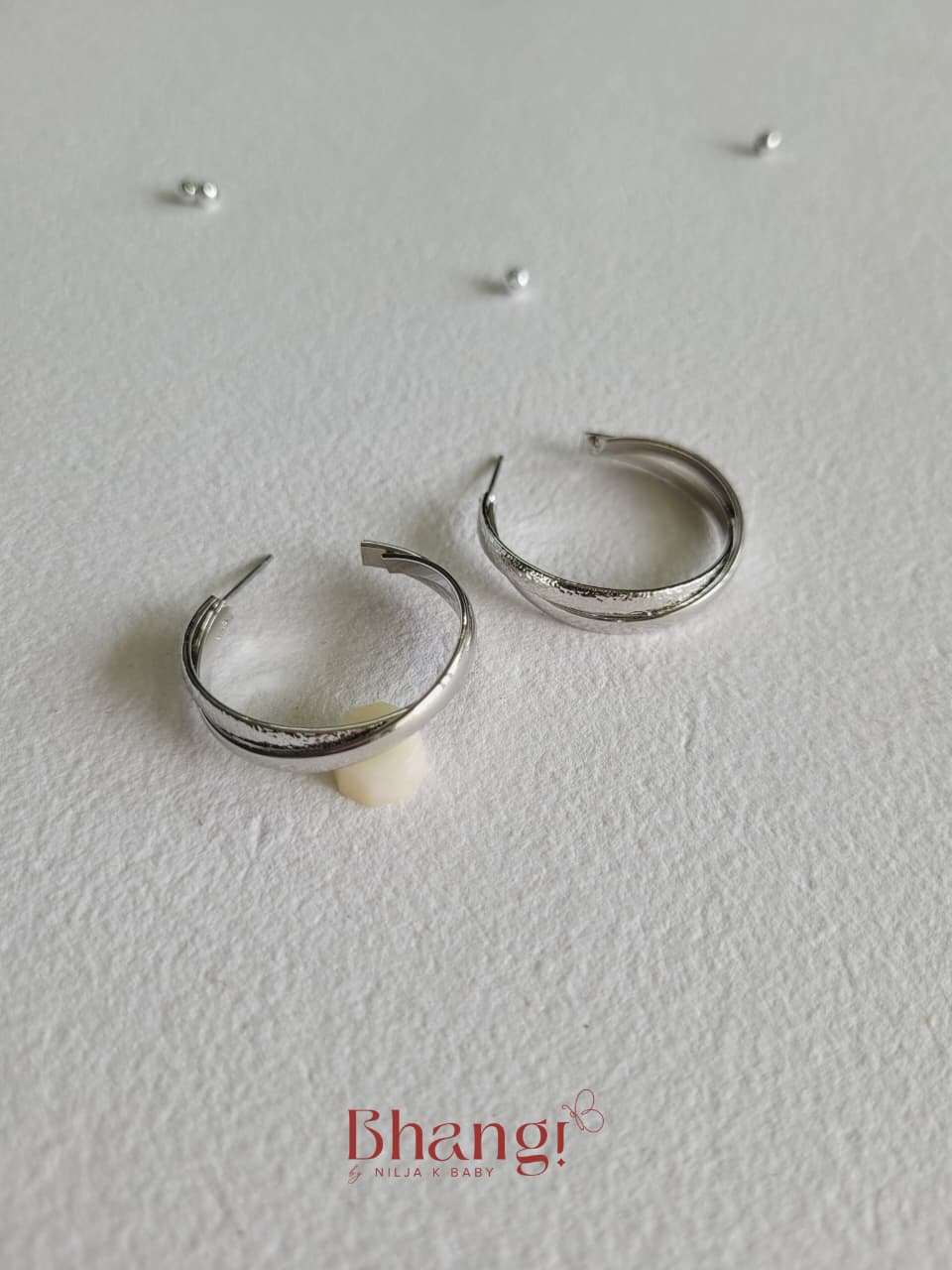 Luna Twist Hoop Earrings – Silver