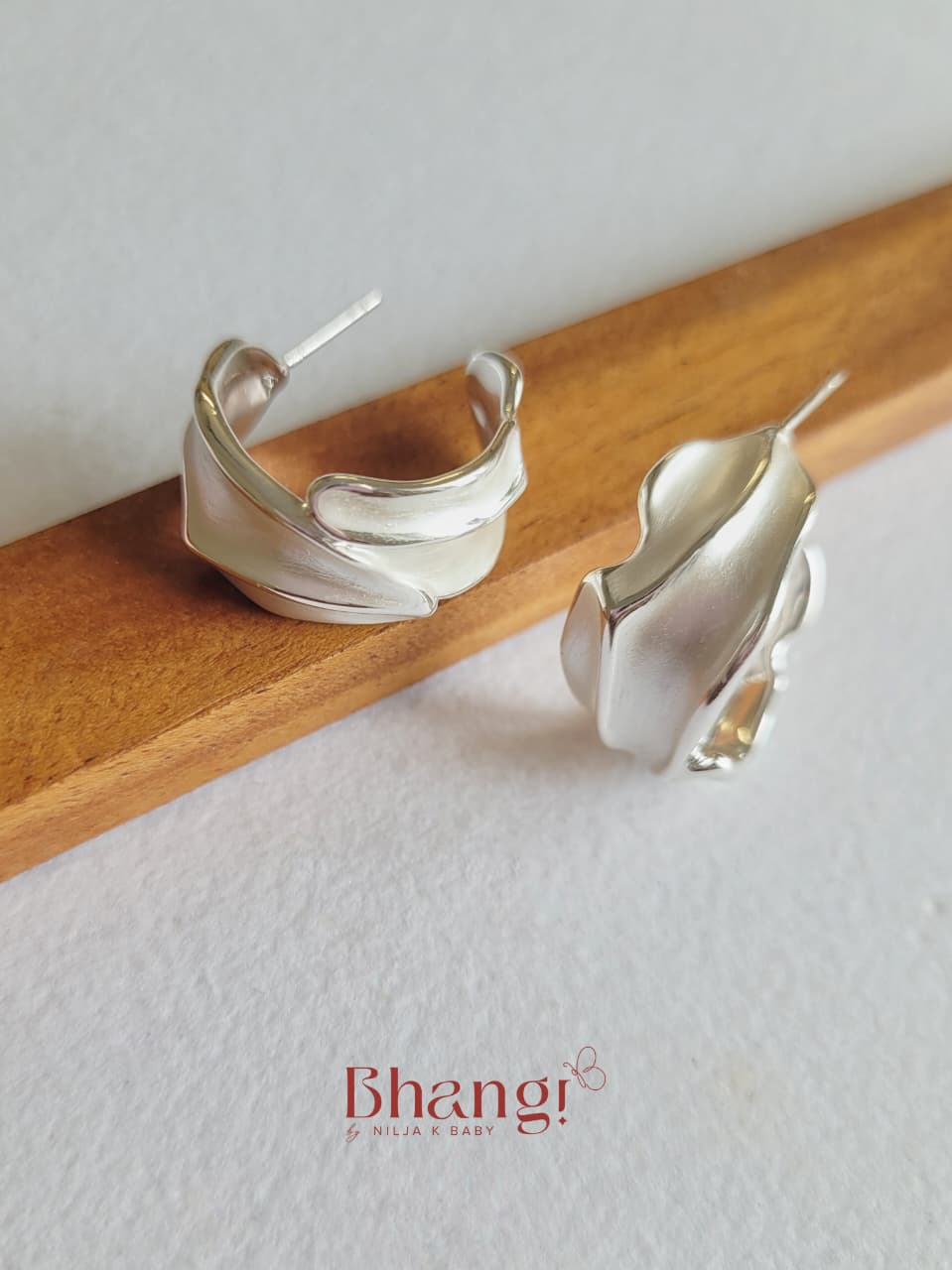 Silver Wave Sculpted Hoop Earrings